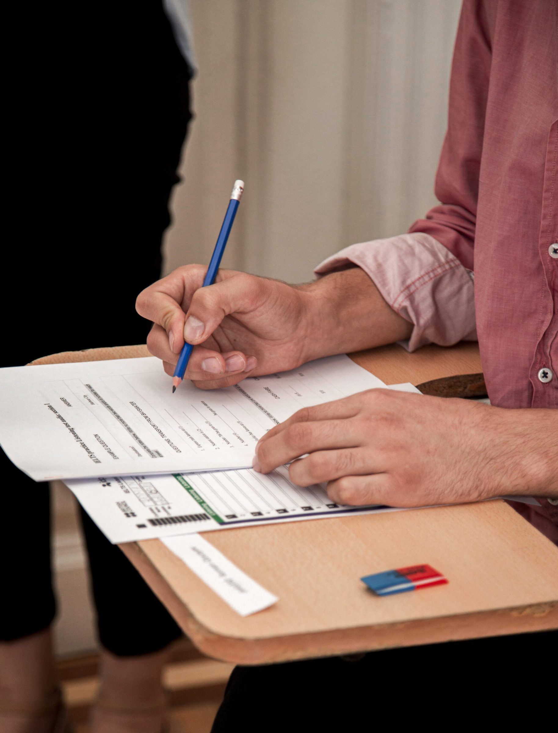 Person filling job application for career